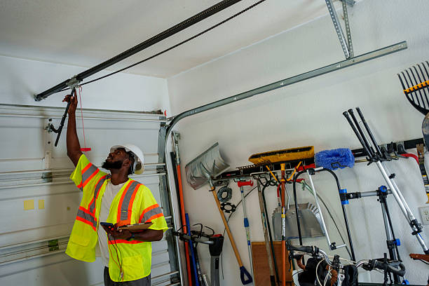 Professional Garage Door Roller Replacement technician working in Central Square, NY